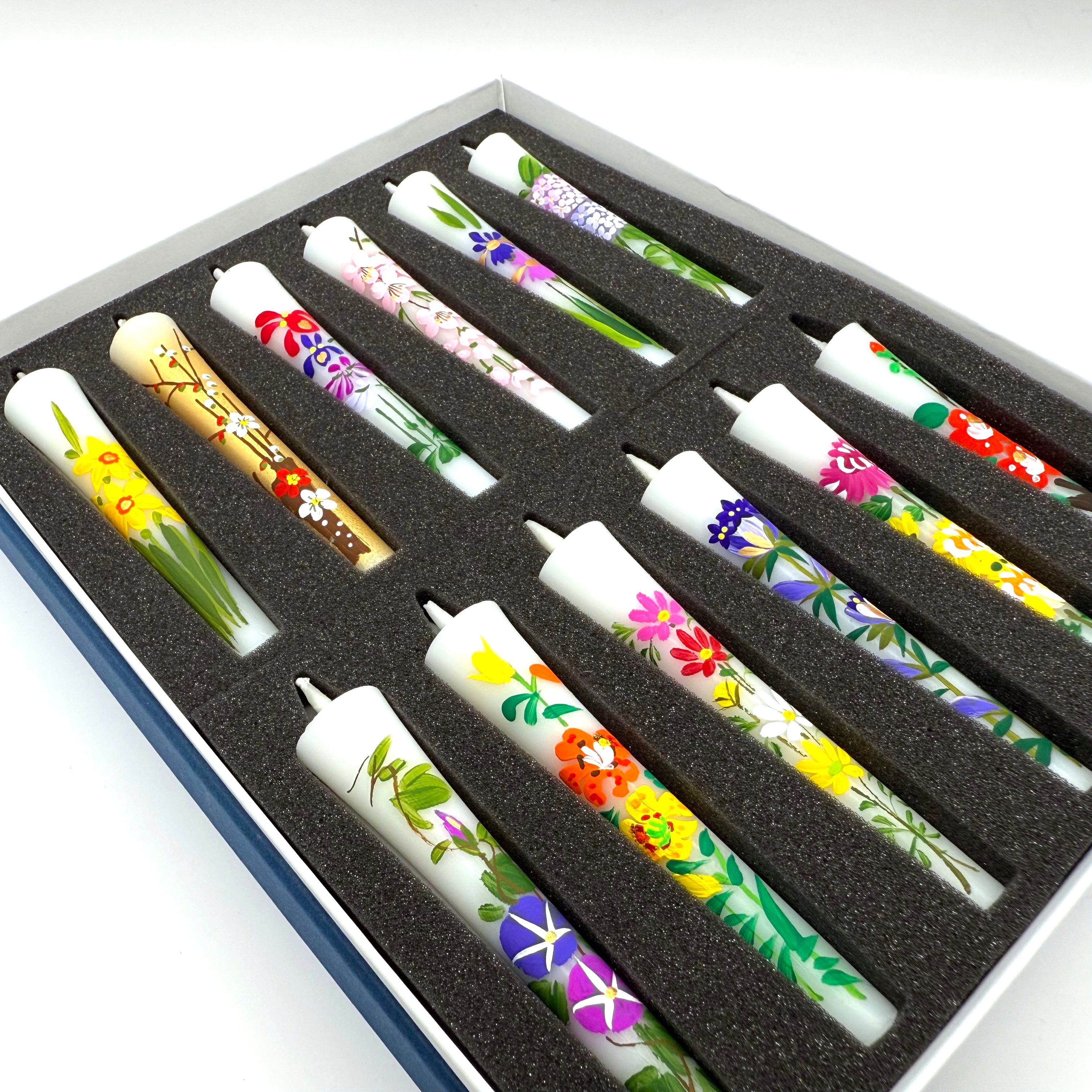 Flower Painted Warosoku Japanese Candles angled view showing hand-painted floral details on each candle in box
