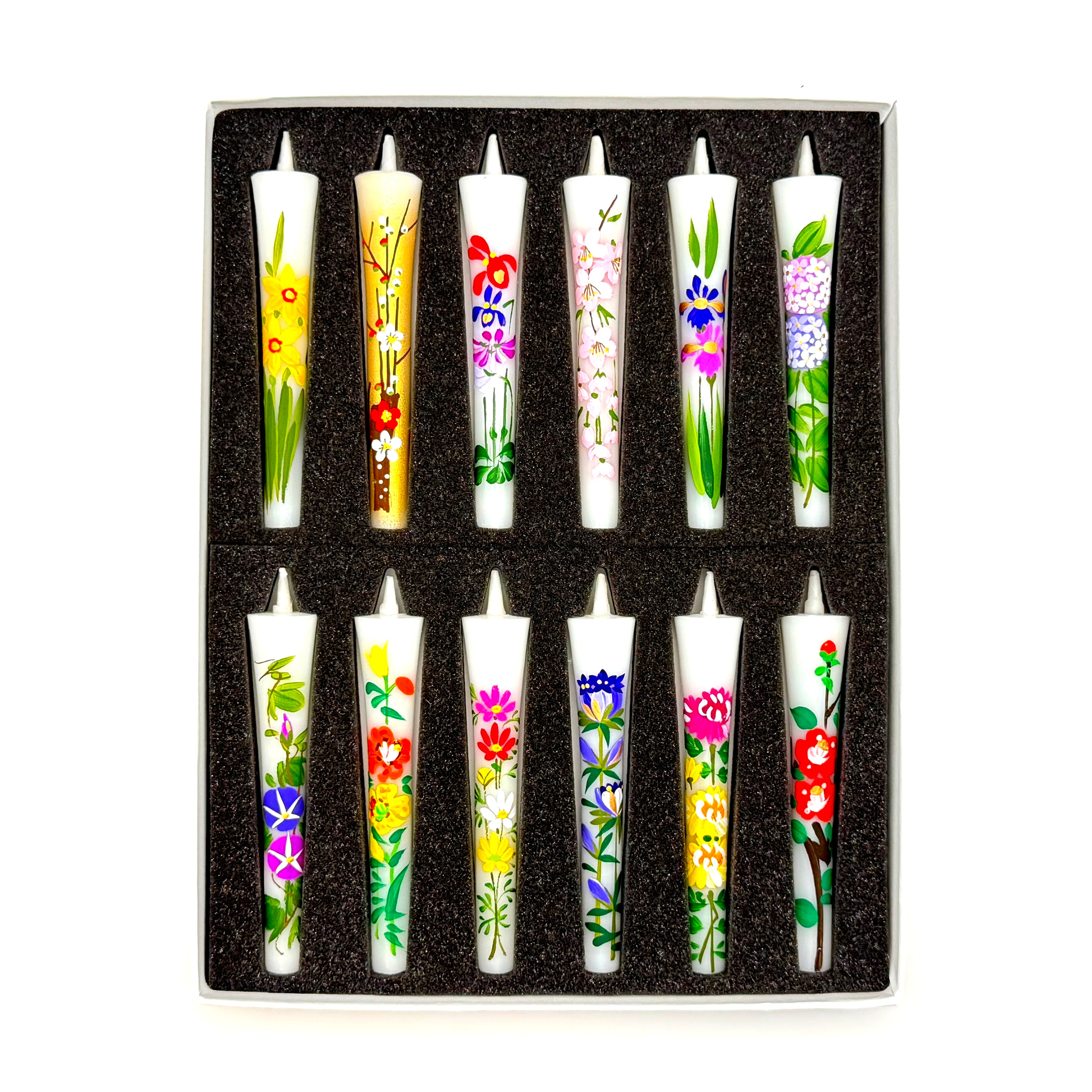 Flower Painted Warosoku Japanese Candles vertical view of 12 painted candles in box