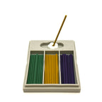 Japanese Floral Incense Stick burning in stand on box of three colors