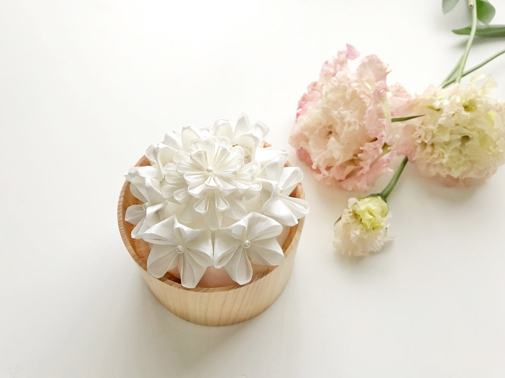 Kaminoka Paper Flower Basket aroma diffuser styled with fresh pink and white flowers