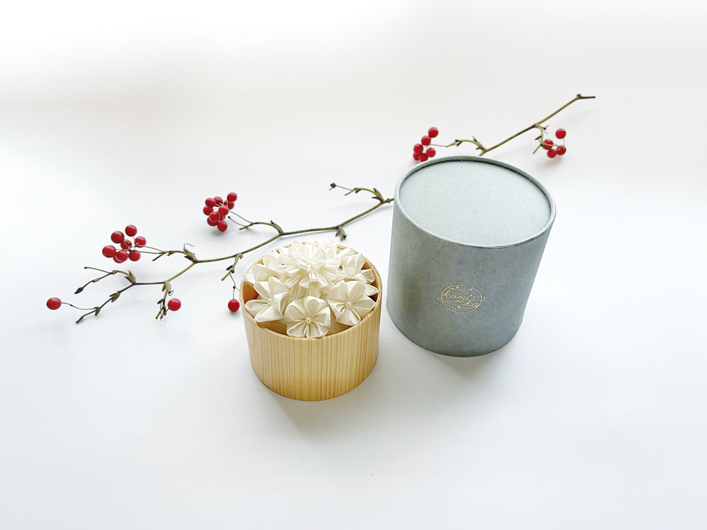 Kaminoka Paper Flower Basket aroma diffuser with gray gift package and red berry branch styling
