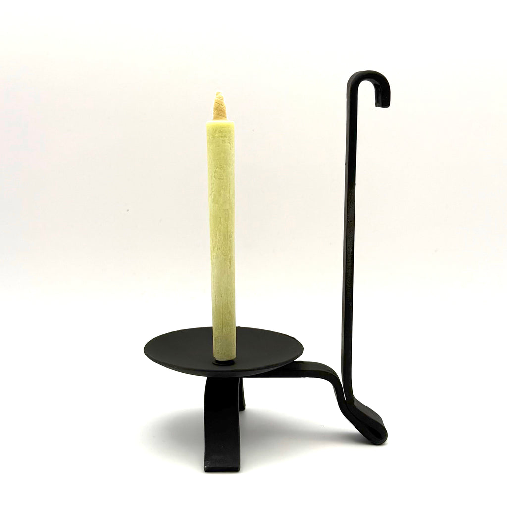 Kamoi Candle Holder with Warosoku candle on iron base, side view