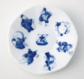 Shichifuku Seven Lucky Gods Saucer in white porcelain with blue Seven Lucky Gods illustrations, top view