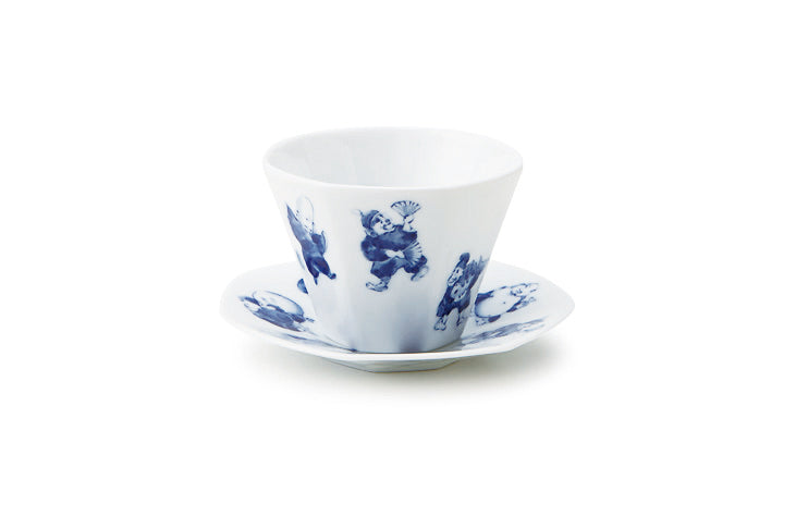 Shichifuku Sencha Teacup with matching saucer in white porcelain with blue Seven Lucky Gods illustrations, side view