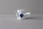 Washokki kyusu teapot in white porcelain with blue Sometsuke swirl pattern, side view