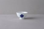 Washokki rice bowl in white porcelain with blue Sometsuke swirl pattern, side view