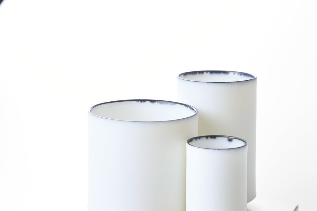 White Line Cup 150ml in Reactive Cobalt Blue, three cups grouped showing variation in cobalt rim flow